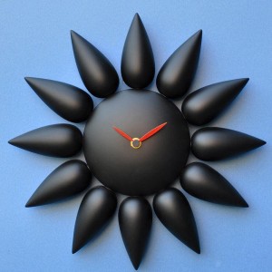 orologio da parete rotondo a forma di sole dalia nero pirondini