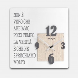 orologio da parete con frase sul tempo